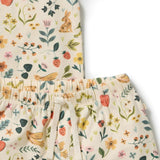 Wilson & Frenchy Kids summer Garden Organic Short sleeve Pyjamas at Cerise. Featuring a lightweight short-sleeve tee and relaxed mid-length shorts, this summer pyjama set offers an easy fit that gives kids plenty of freedom to move. The soft elasticated waistband sits gently on little tummies, making these organic cotton pyjamas comfortable enough for bedtime, lazy mornings and lounging at home.
