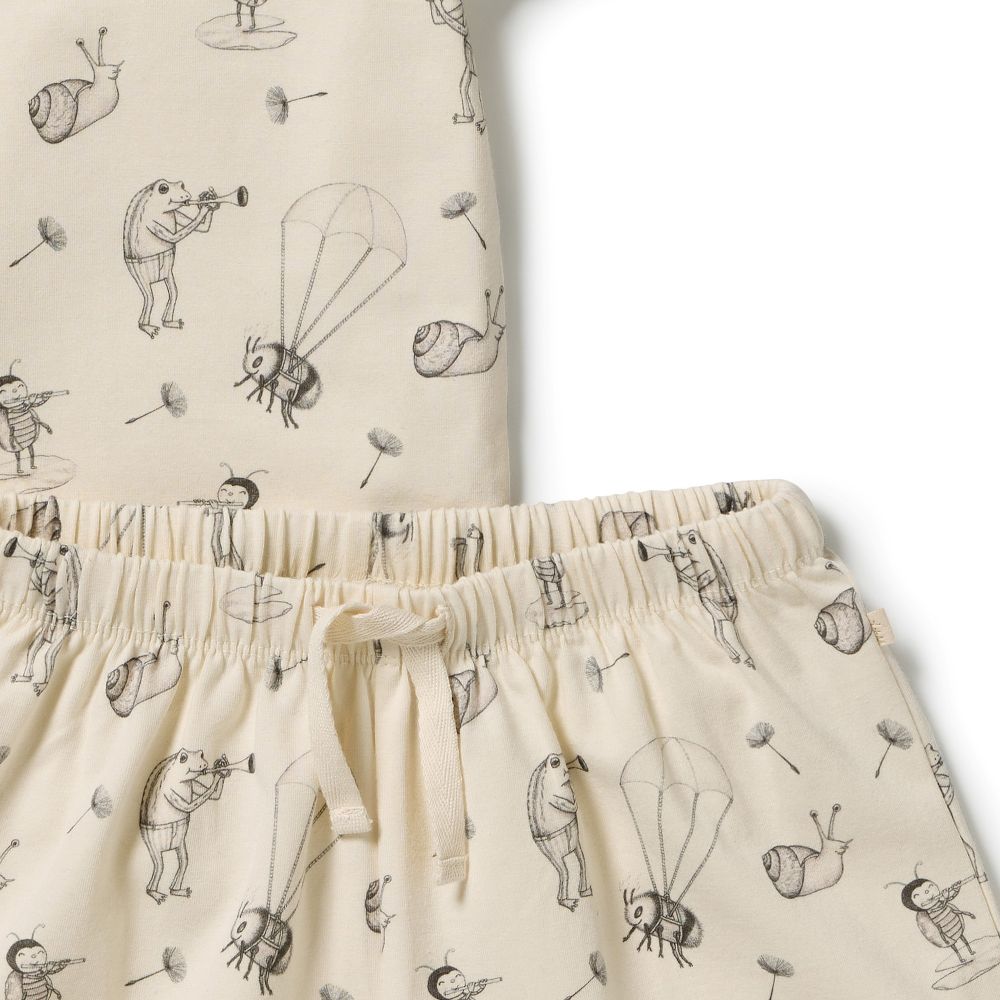 Wilson & Frenchy Kids Whispering Willows Organic Short sleeve Pyjamas at Cerise. Featuring a lightweight short-sleeve tee and relaxed mid-length shorts, this summer pyjama set offers an easy fit that gives kids plenty of freedom to move. The soft elasticated waistband sits gently on little tummies, making these organic cotton pyjamas comfortable enough for bedtime, lazy mornings and lounging at home.