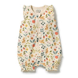 Wilson & frenchy Summer Garden Organic Ruffle Zipsuit at Cerise. Featuring an enchanting all-over Summer Garden print, this baby zipsuit is finished with adorable ruffle cap sleeves for a playful, feminine touch. The comfortable design allows plenty of freedom for little ones to move, play and explore.

A convenient two-way zip through the centre front makes dressing and nappy changes quick and easy, while shirring around the leg openings provides a flexible, comfortable fit that accommodates growing babies