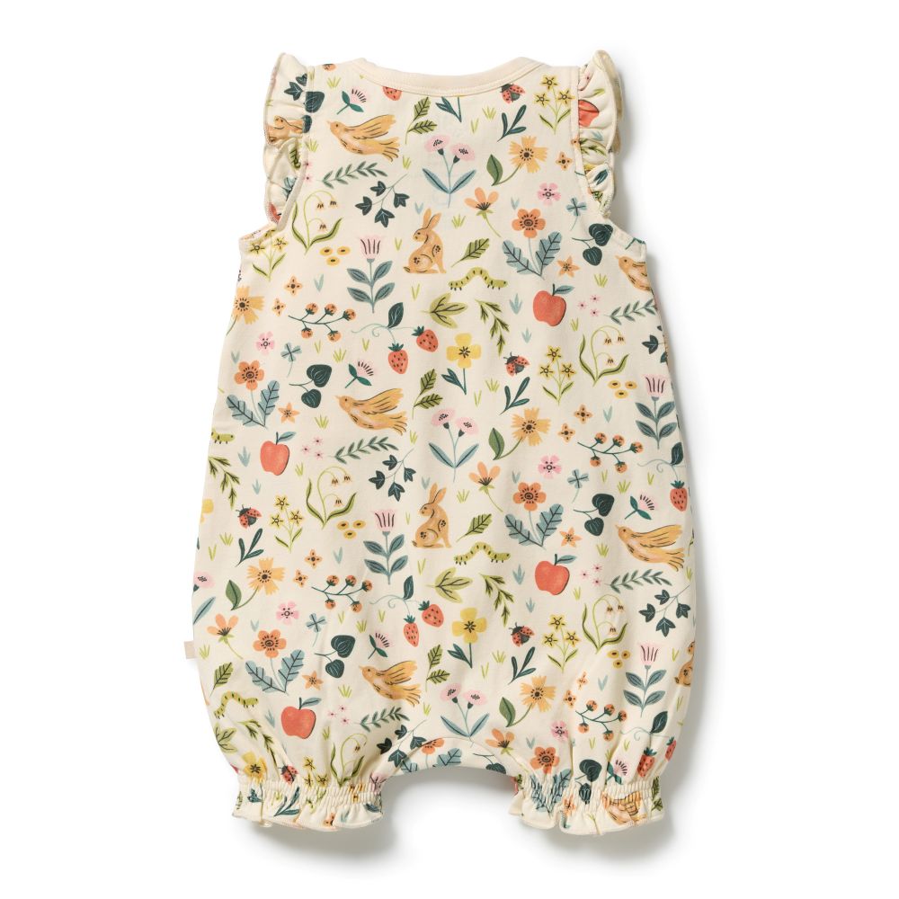 Wilson & frenchy Summer Garden Organic Ruffle Zipsuit at Cerise. Featuring an enchanting all-over Summer Garden print, this baby zipsuit is finished with adorable ruffle cap sleeves for a playful, feminine touch. The comfortable design allows plenty of freedom for little ones to move, play and explore.

A convenient two-way zip through the centre front makes dressing and nappy changes quick and easy, while shirring around the leg openings provides a flexible, comfortable fit that accommodates growing babies