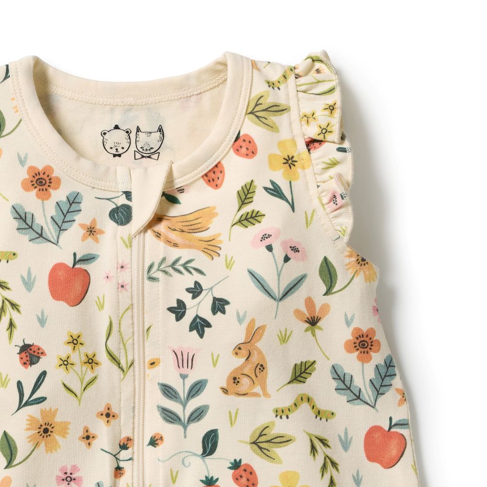 Wilson & frenchy Summer Garden Organic Ruffle Zipsuit at Cerise. Featuring an enchanting all-over Summer Garden print, this baby zipsuit is finished with adorable ruffle cap sleeves for a playful, feminine touch. The comfortable design allows plenty of freedom for little ones to move, play and explore.

A convenient two-way zip through the centre front makes dressing and nappy changes quick and easy, while shirring around the leg openings provides a flexible, comfortable fit that accommodates growing babies