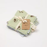 Over the Dandelions Set of 2 Baby Wash cloths in Meadow design at Cerise.  Featuring  a gorgeous brown  bunny print on a soft green base.Made from 100% organic cotton muslin and cotton terry.