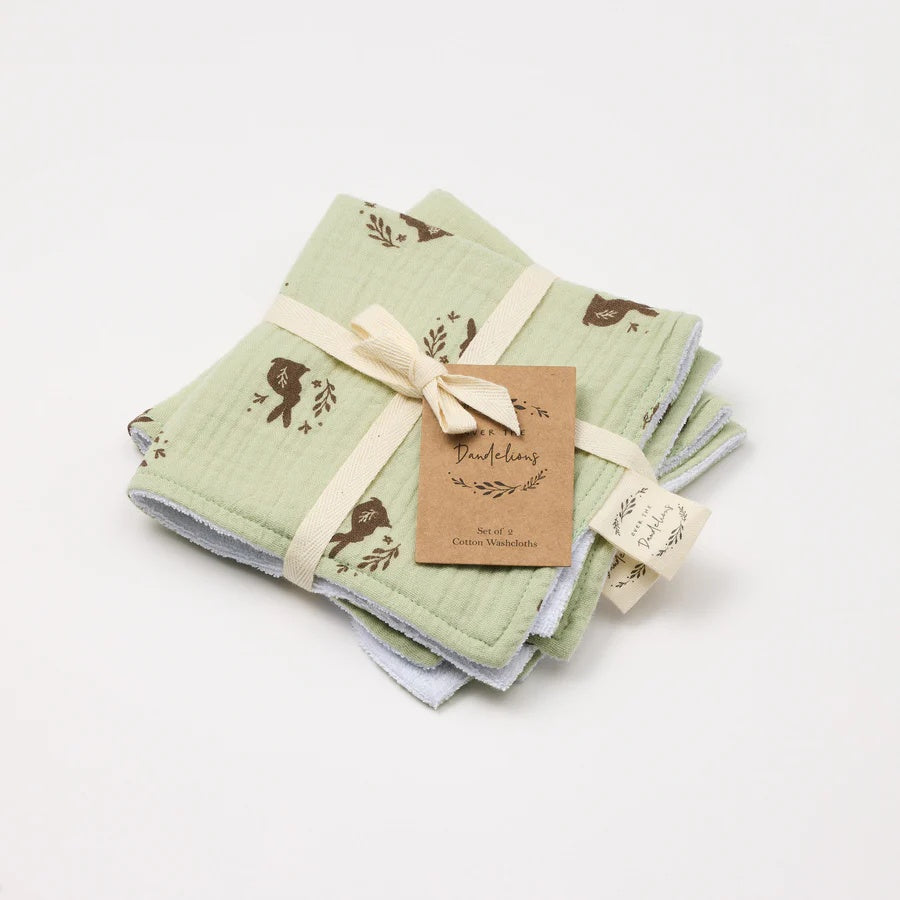 Over the Dandelions Set of 2 Baby Wash cloths in Meadow design at Cerise.  Featuring  a gorgeous brown  bunny print on a soft green base.Made from 100% organic cotton muslin and cotton terry.