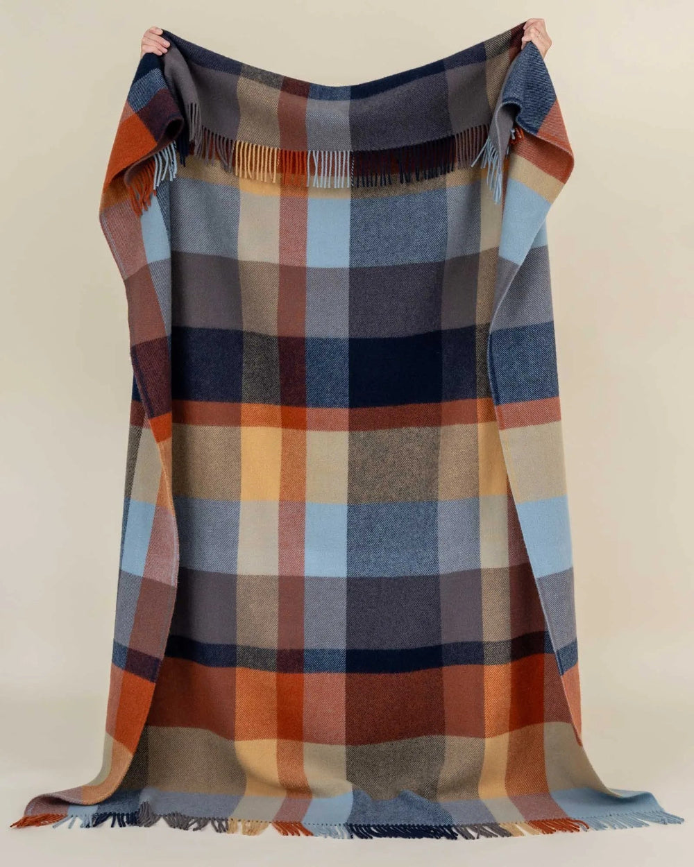 Weave Fairway Throw at Cerise.  The Fairway Throw in multi features a multi coloured check desing in a mixture of blues and earthy tones. Generous sizing a t 140cm x 240cm