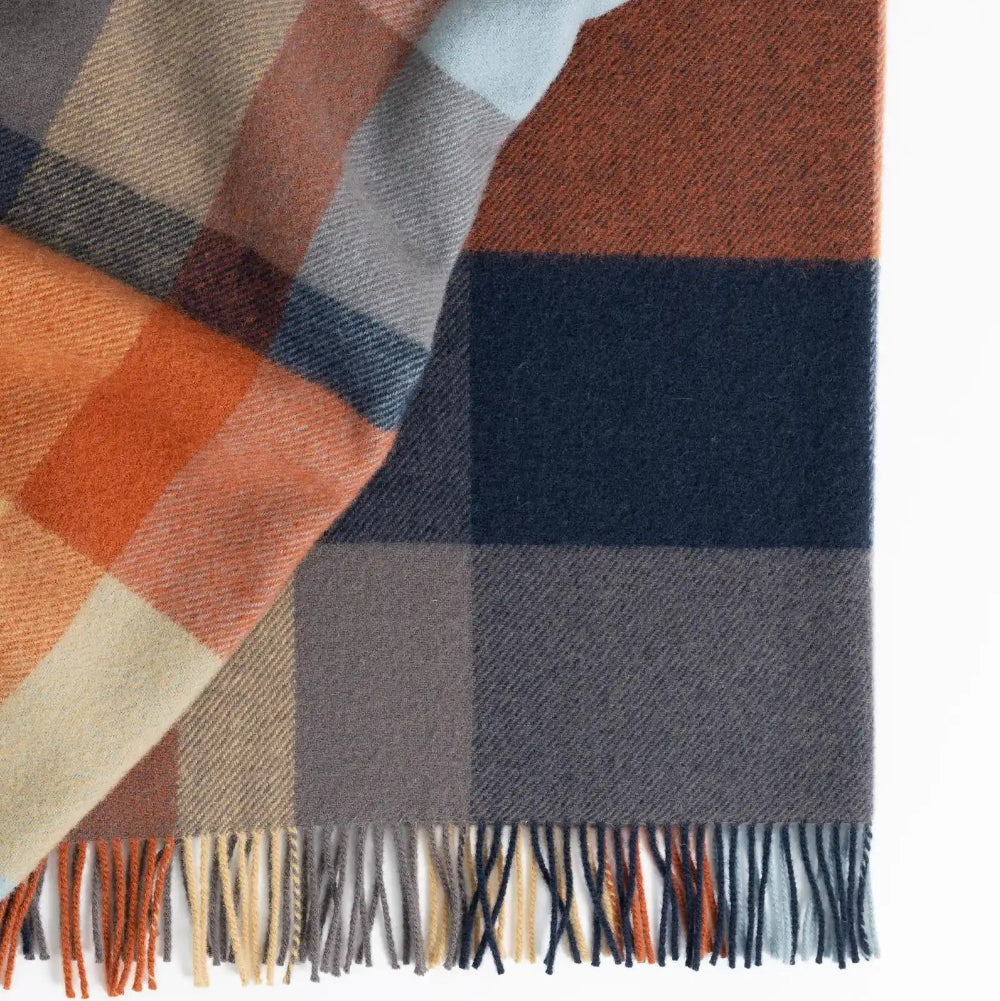 Weave Fairway Throw at Cerise.  The Fairway Throw in multi features a multi coloured check desing in a mixture of blues and earthy tones. Generous sizing a t 140cm x 240cm