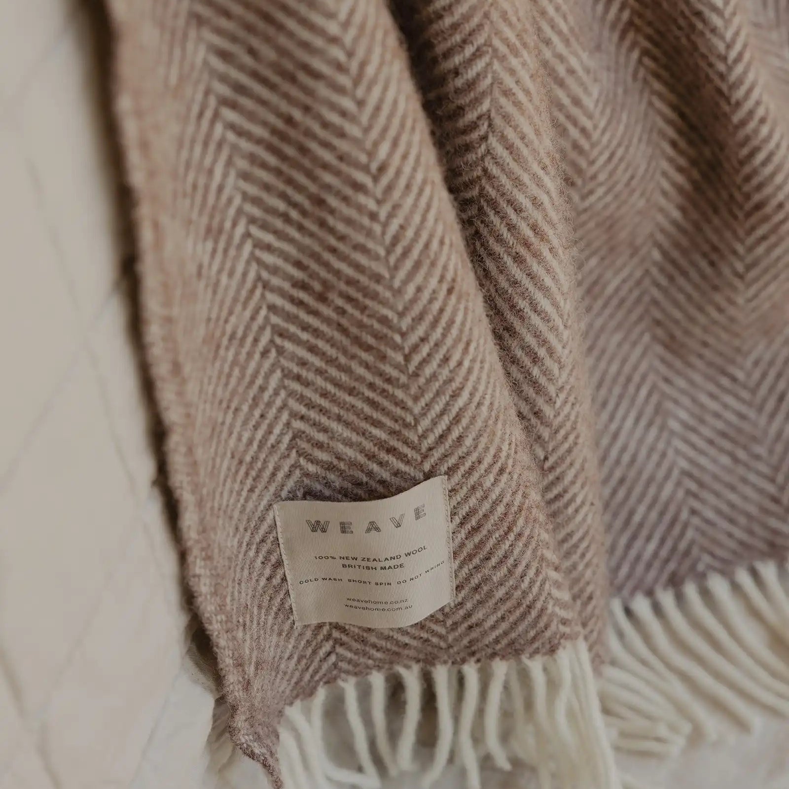Weave Throw in cocoa colour with natural tassels and 100% wool at Cerise.