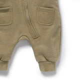 Wilson & Frenchy 100% organic cotton growsuit in a lovely olive colour to suit baby girls and boys. Features front zip and patch pockets  at Cerise NZ