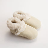 Woolbabe Lambskin Booties for baby in a soft natural Toetoe colourway at Cerise. Made in New Zealand.