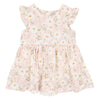 Floral dress with ruffled sleeves with white daisys on a pink background