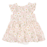 Floral dress with ruffled sleeves with white daisys on a pink background