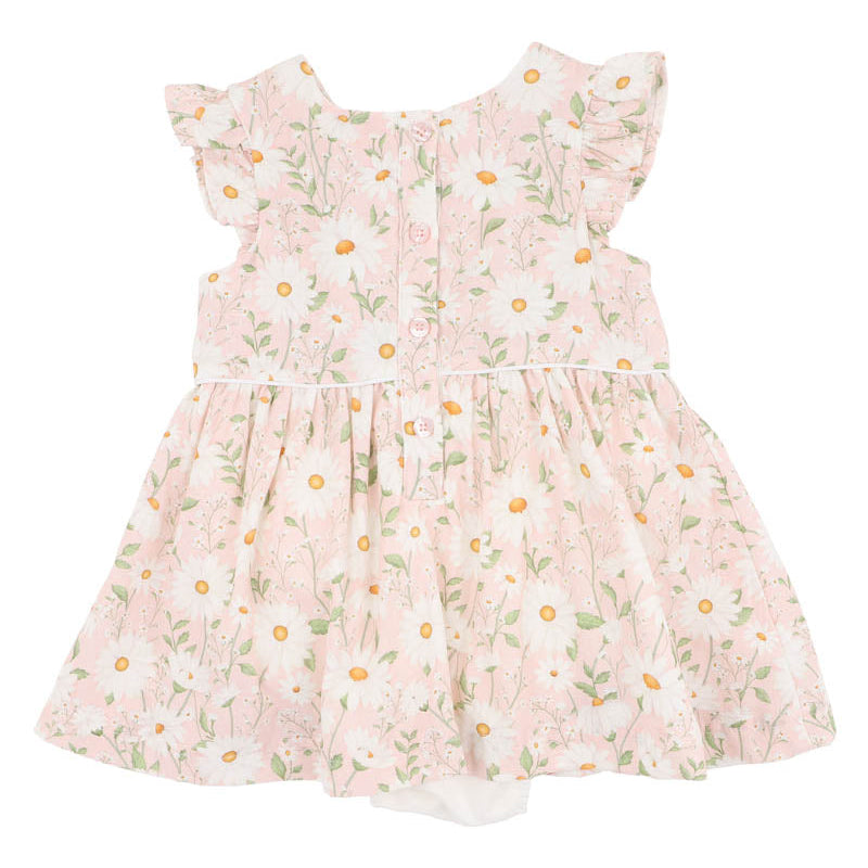 Floral dress with ruffled sleeves with white daisys on a pink background