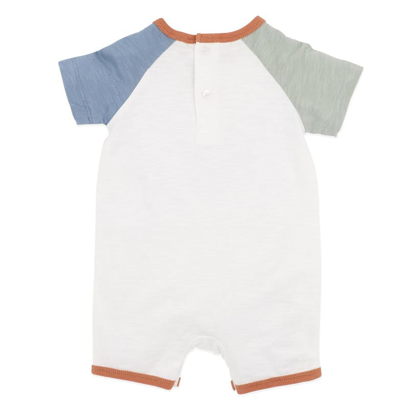 Baby romper in white with green and white sleevews and a tractor print on the front.