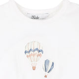 White t-shirt with hot air balloon design and 'Bebe' branding on a white background