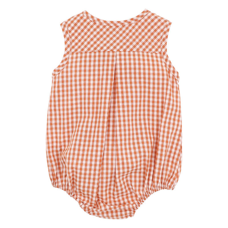 Orange and white sleeveless baby romper suit with wooden buttons