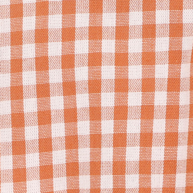 Orange and white sleeveless baby romper suit with wooden buttons