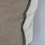  CC Interiors Sabra Linen Cushion Cover in beige at Cerise. 50x50cm natural linen cushion cover with striated trim. Unfilled; inner sold separately.