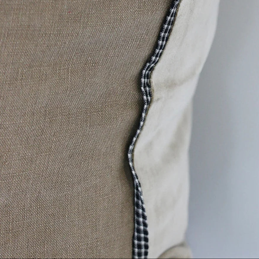  CC Interiors Sabra Linen Cushion Cover in beige at Cerise. 50x50cm natural linen cushion cover with striated trim. Unfilled; inner sold separately.