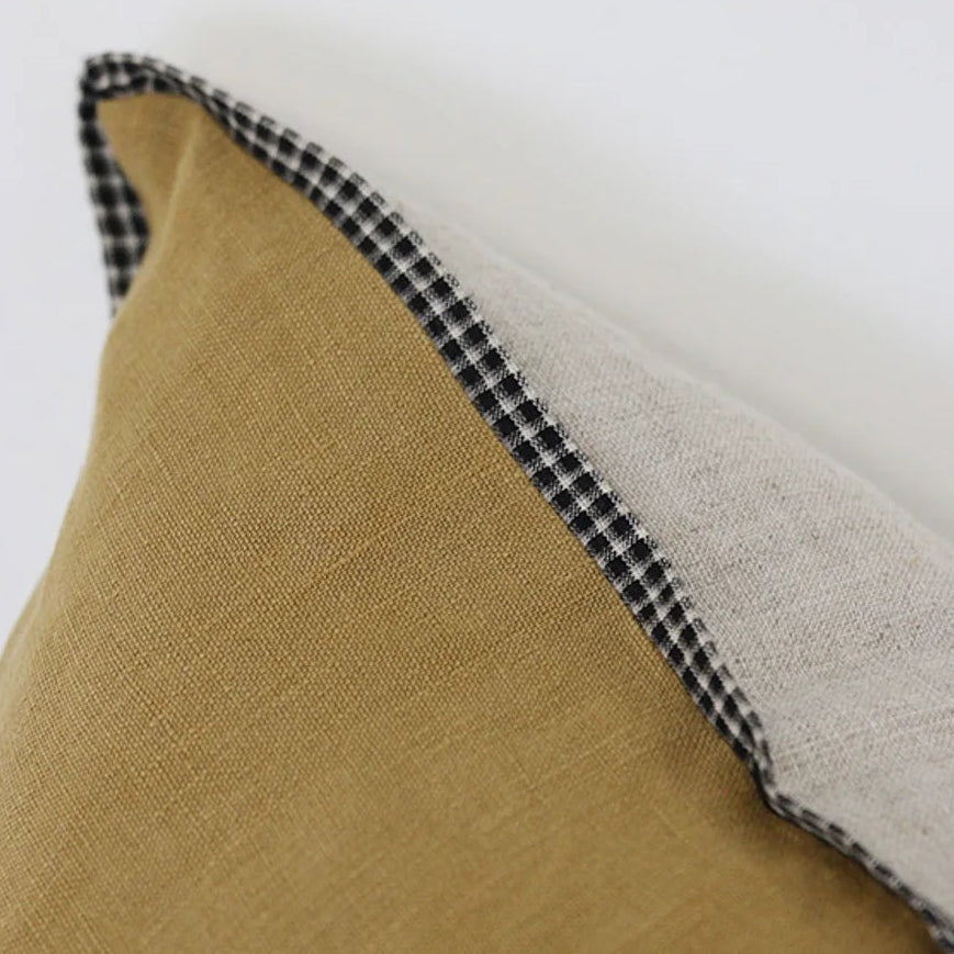 CC Interiors Mustard Linen Cushion Cover with Natural Linen Back and striated Trim at Cerise. Measures 50 x 50cm.