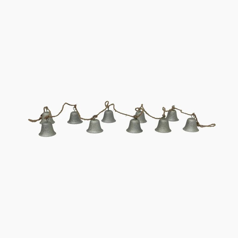 String of small bells on a white background