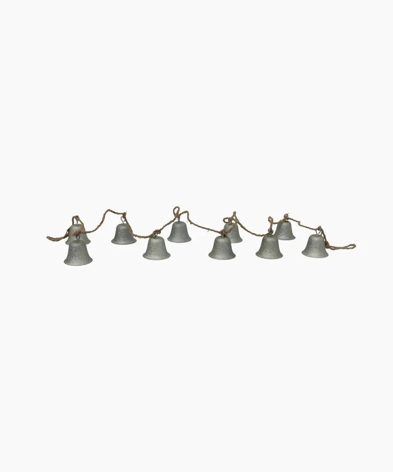 String of small bells on a white background