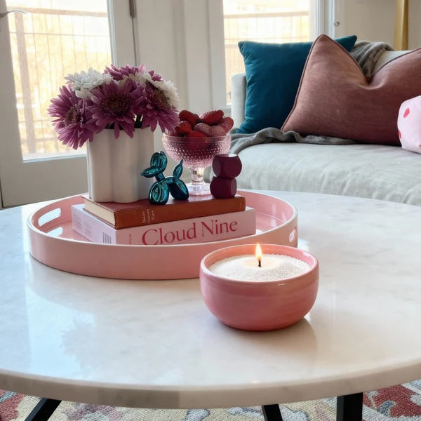 bowl on sand wax on table  - cerise