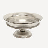Large silver bowl on pedestal base.