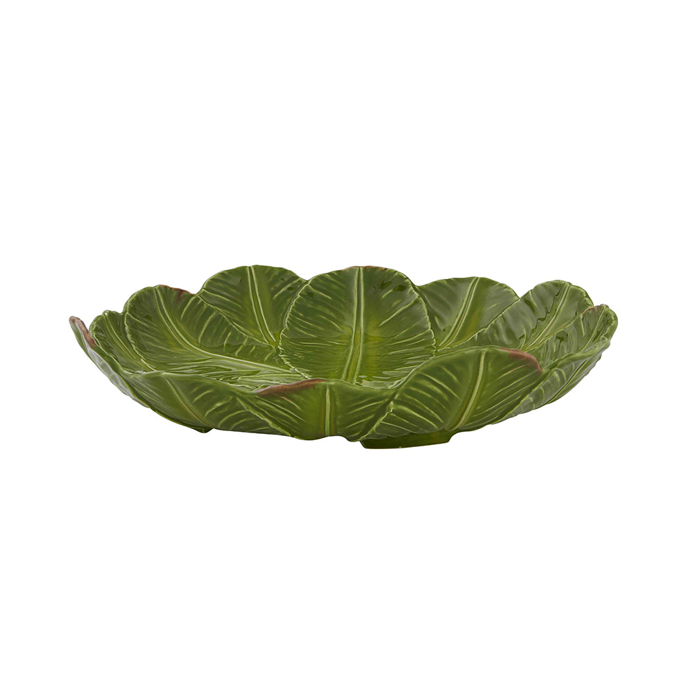 Green leaf-shaped bowl on a white background