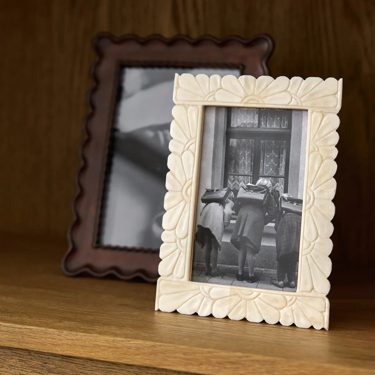 Floral etched and carved rectangular shaped photo frame on shelf dispaly