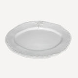 Small White stoneare oval shaped platter with a dragonfly moif
