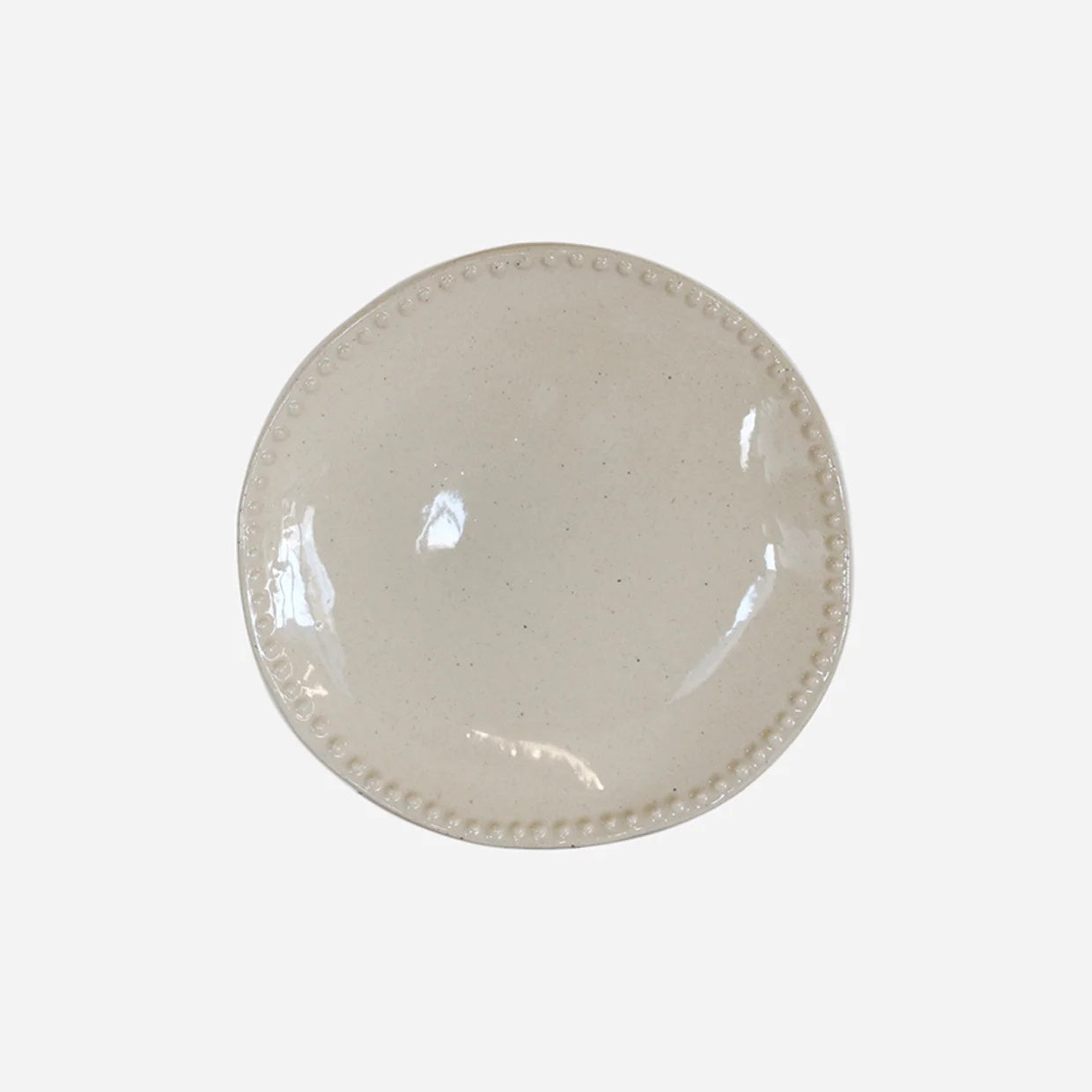 CC Interiors Lisette Dish in Sand Ceramic Glaze with Dot detail around outer edge.  Measure 125mm diameter.