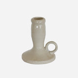 CC Interiors Lisette Candle Holder at Cerise.  Mde from natural-coloured ceramic, this lovely little taper candle holder combines simple, organic styling with a practical handle, making it easy to move and display wherever you want a little extra ambience.