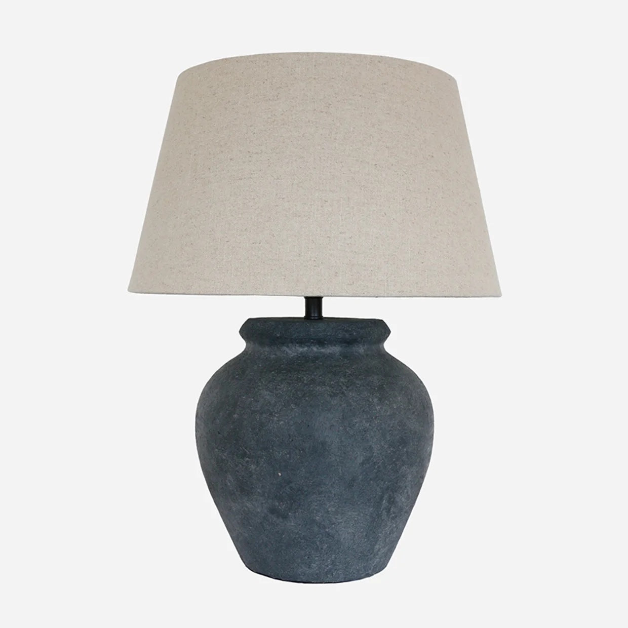 CC Interiors Greywake ceramic lamp base in matt charcoal with raw linen tapered drum shade at Cerise. Base and shade sold seperately.