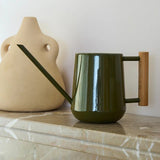 Olive Green watering can with a wooden handle