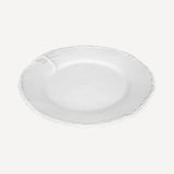 White stoneware glazed lunch plate featuring a dragonfly design