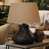 CC Interiors Genie Beaten Bronze Lampbase at Cerise looks great with a natural linen coloured shade.