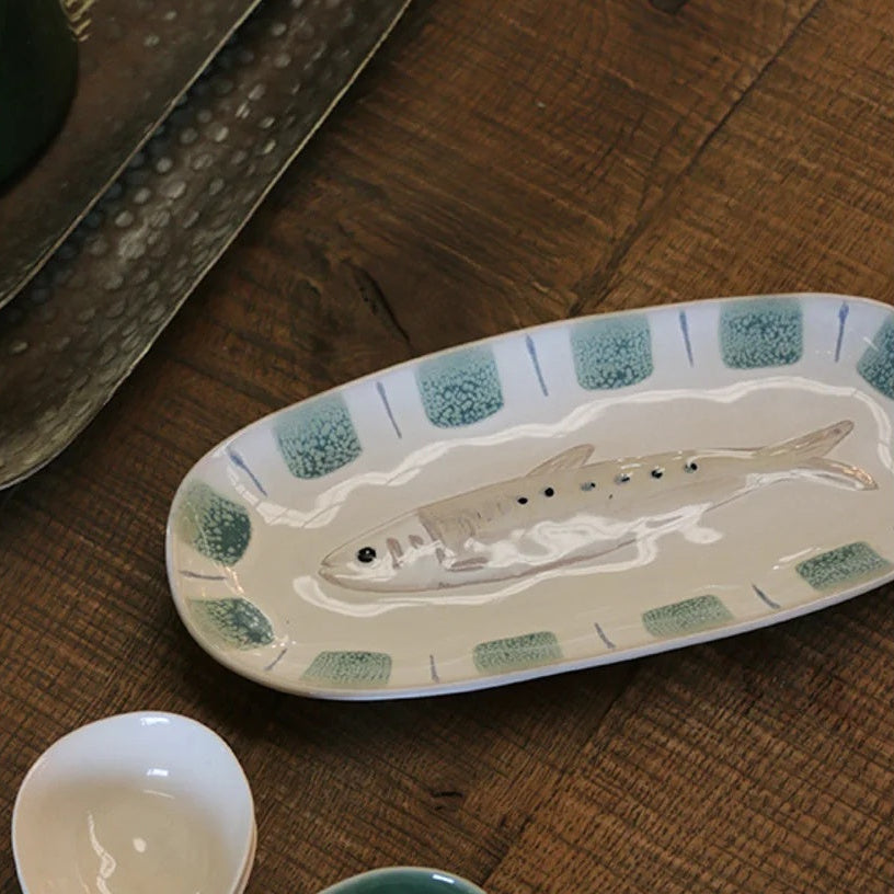 CC Interiors Sushi Plate in natural stoneware at Cerise.  Featuring a glazed finish and embossed fish detail, perfect for sushi, sashimi and appetisers