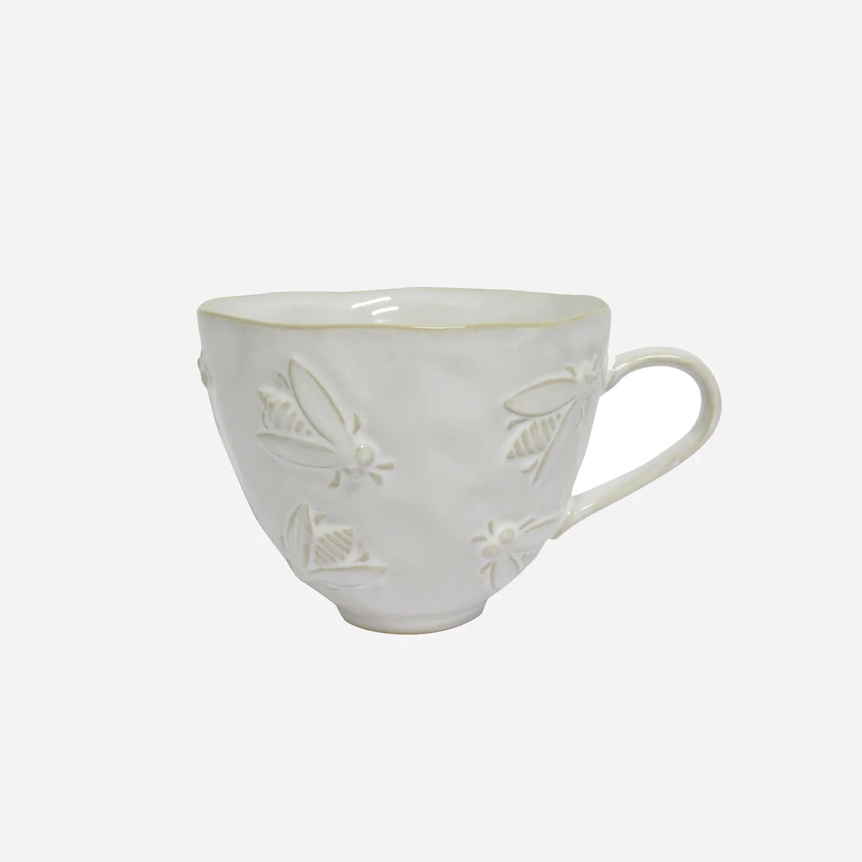 CC Interiors Abeille ceramic cup with embossed bee design and natural coloured glaze at Cerise