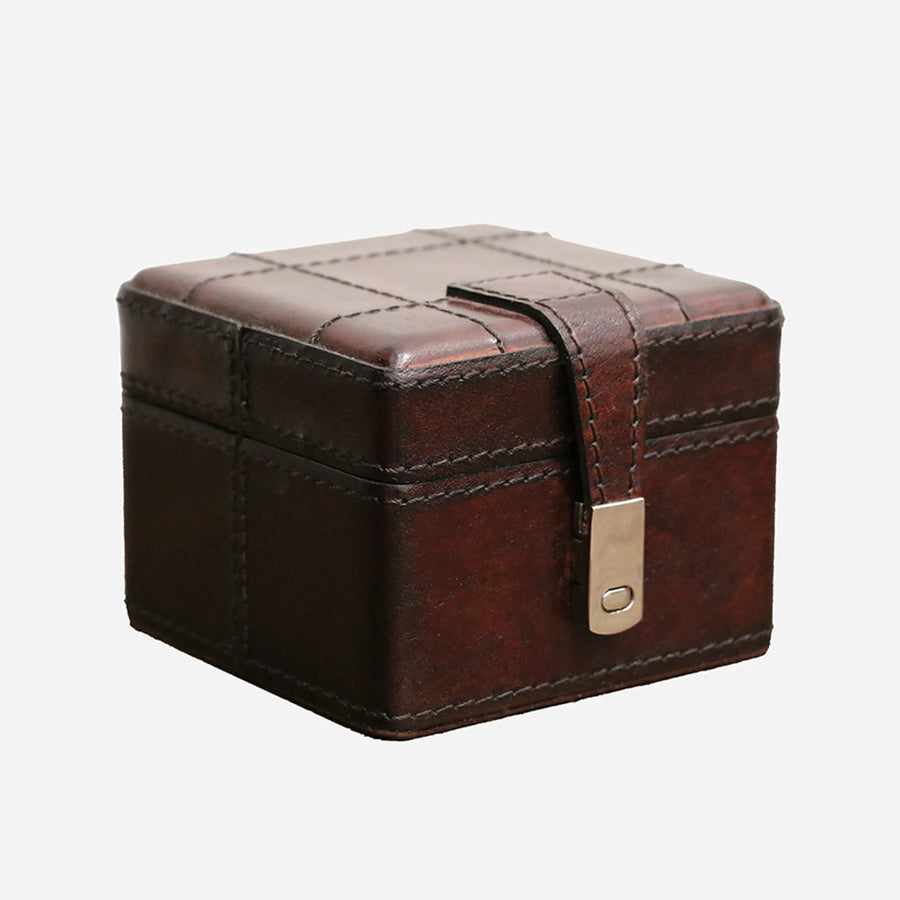 Watch box in dark brown leather with brass coloured clasp