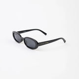Black oval sunglasses on a white background side view showing stella and gemma branding on arm