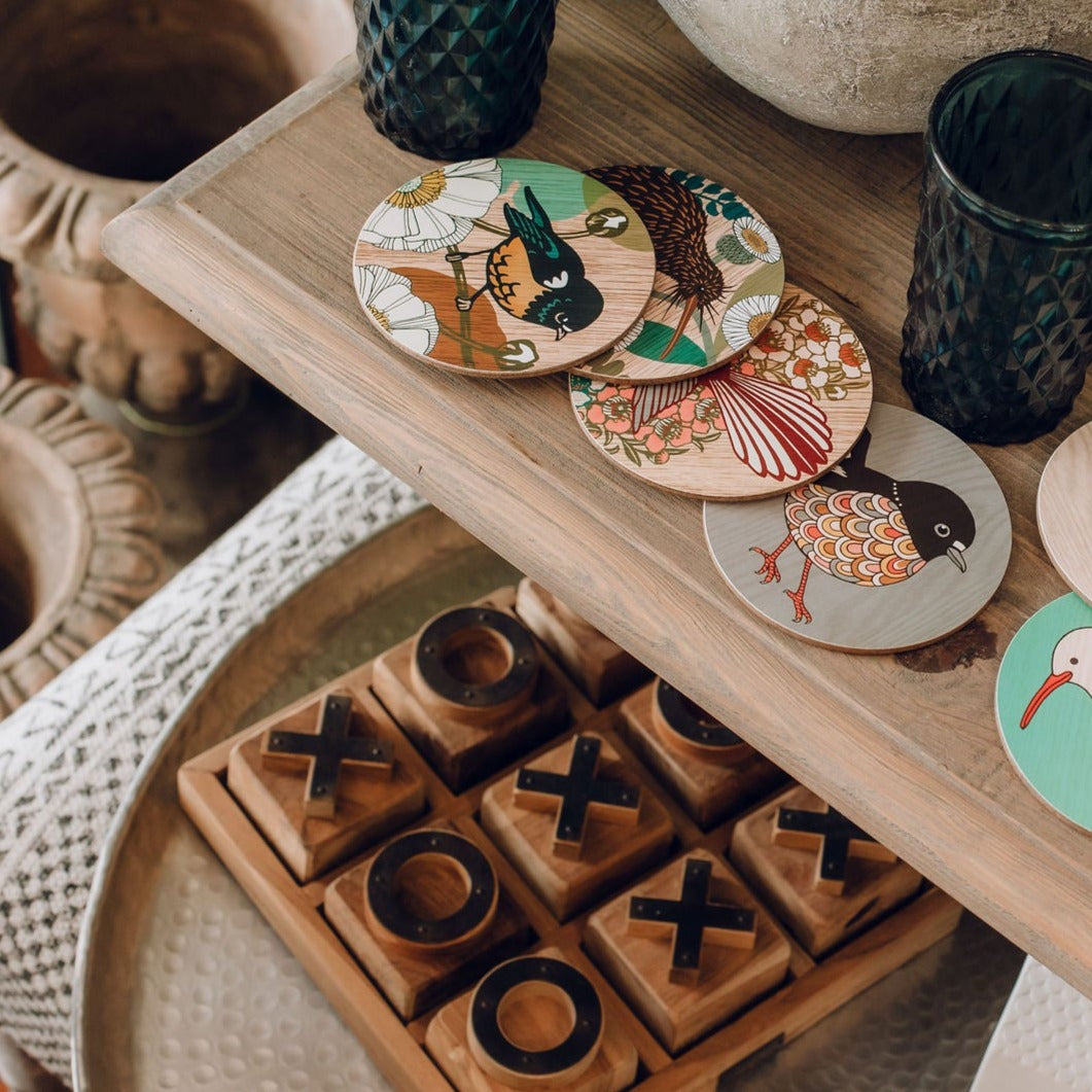 Noughts and crosses set in natural teak