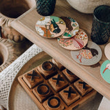 Noughts and crosses set in natural teak