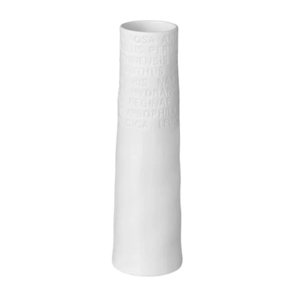 White porcelain vase with imprint of flowers accross top