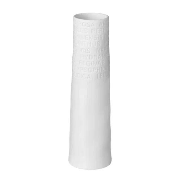 White porcelain vase with imprint of flowers accross top