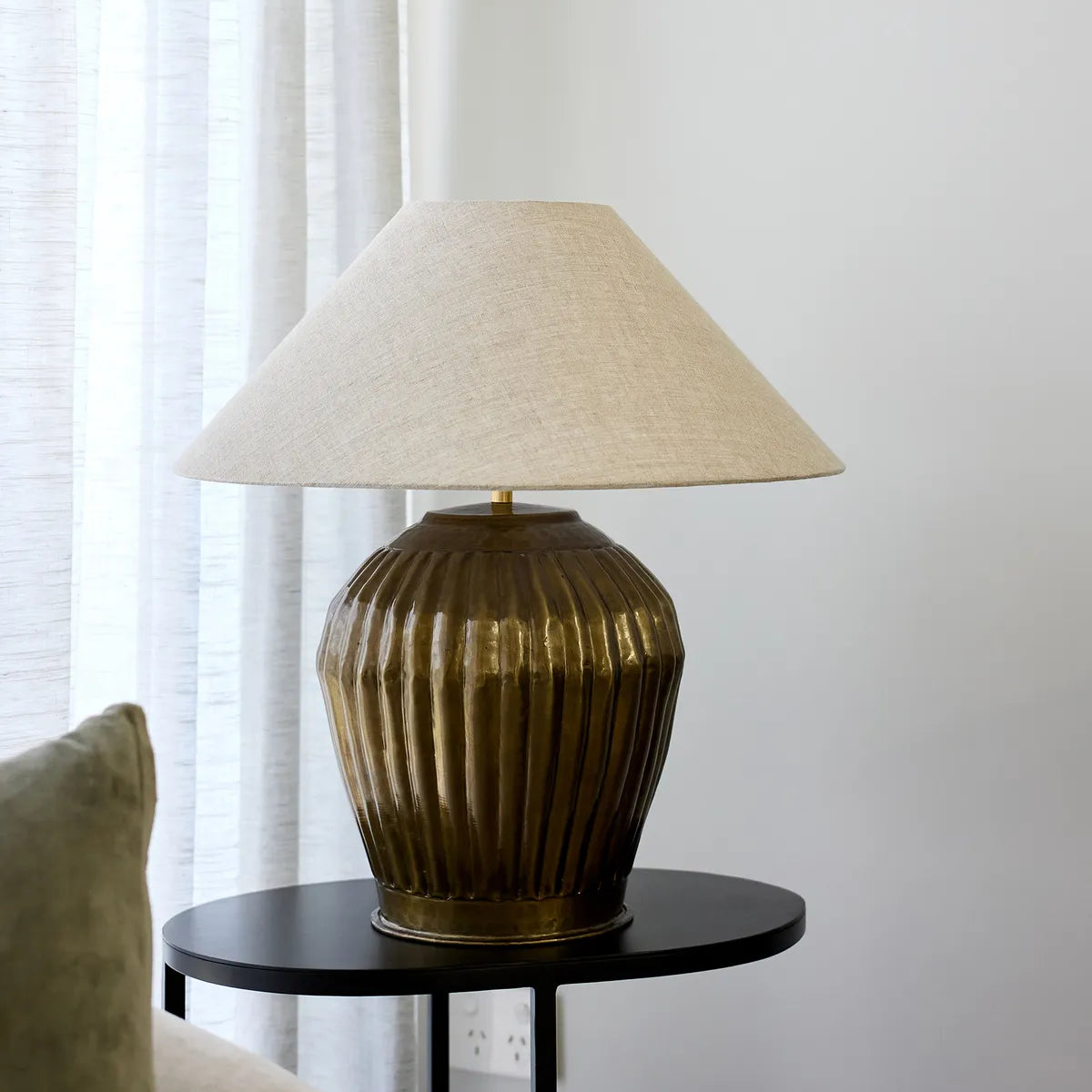 Ribbed antique gold bulbulus lampbase with natural coloured shade shade