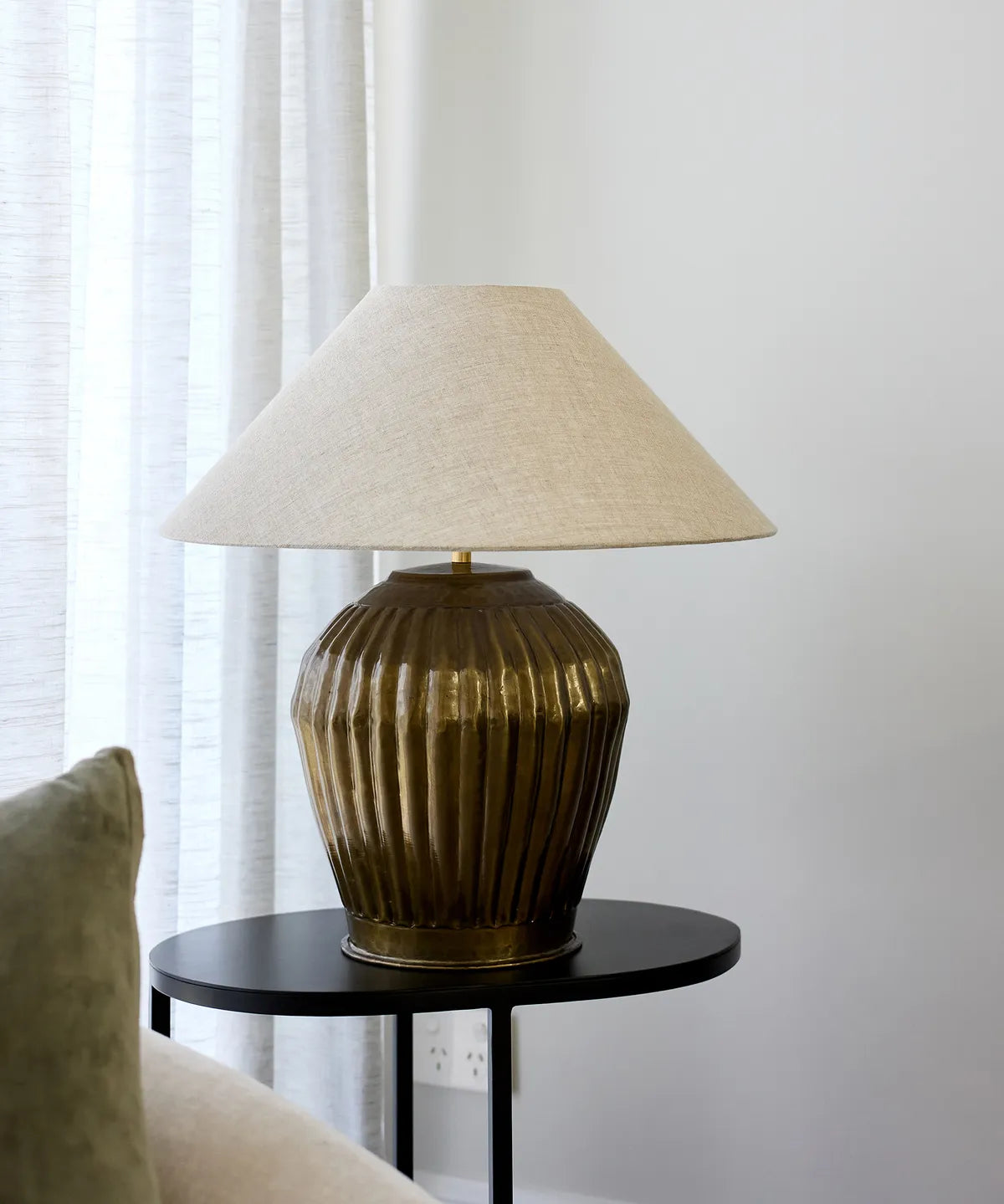 Ribbed antique gold bulbulus lampbase with natural coloured shade shade