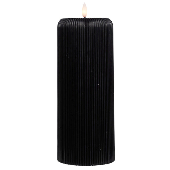Black ribbed large candle with LED flame