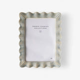  Photo frame in cream with blue wave lines aroung the edges