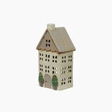 Cream Tealight house with lots of windows and a stone pot with tree either side of the doorway