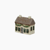 Small cream tealigh house with frontswag in green holly