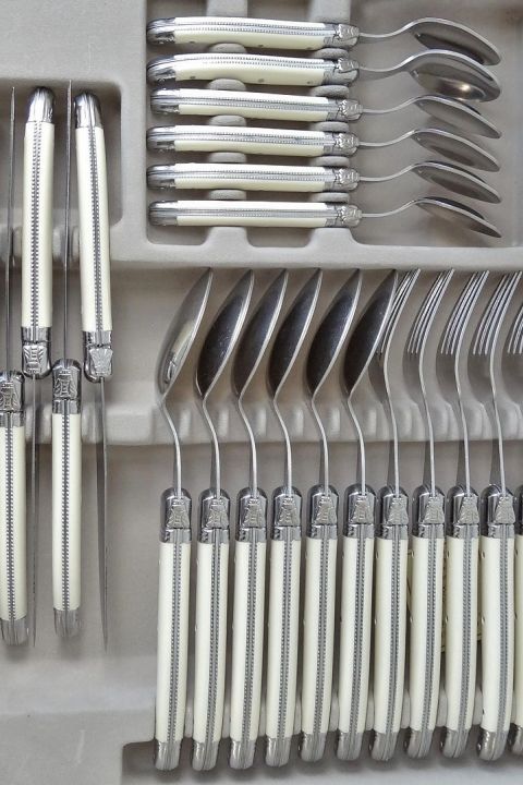 Laguiole by Jean Neron 24 piece cutlery set with ivoury handles a Cerise NZ